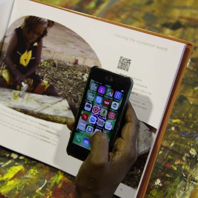 Cassandra Algy demonstrates using QR codes to hear audio of the Gurindji text in the Kawarla book.